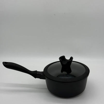 Side angle view of Chef and Cook non stick milk pan with glass lid