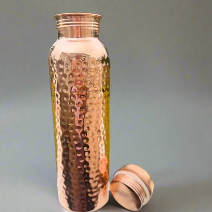 Hammered Pure Copper Water Bottle 950ml handcrafted reusable copper drinking bottle with leak-resistant lid.