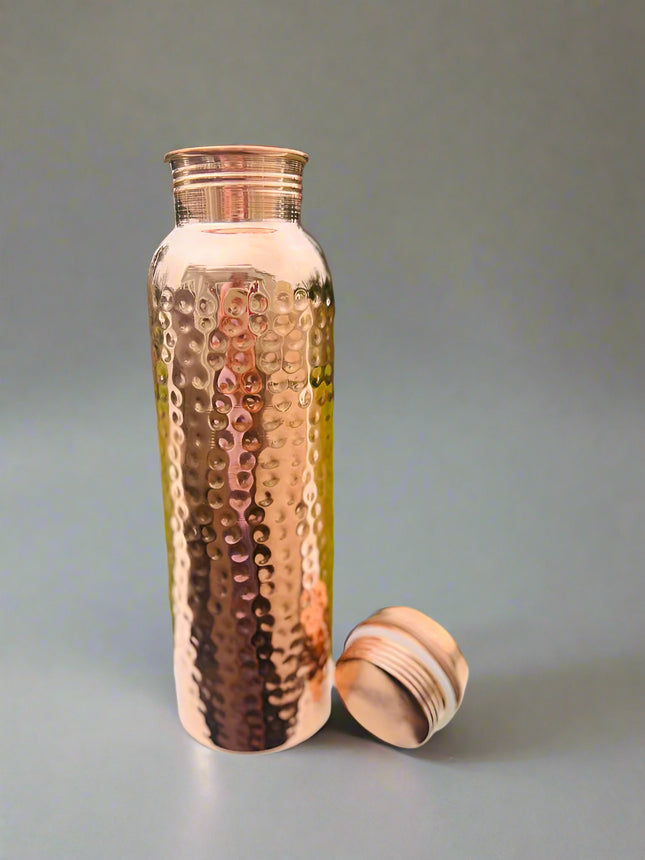 Hammered Pure Copper Water Bottle 950ml handcrafted reusable copper drinking bottle with leak-resistant lid.