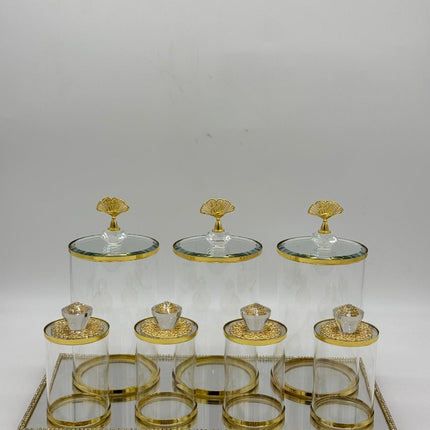Luxury 7 piece gold glass kitchen canister set with decorative tray on white background