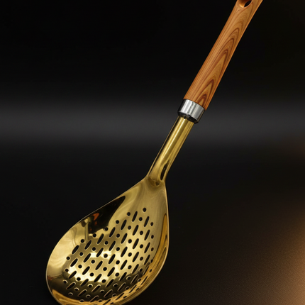 Luxury gold stainless steel skimmer spoon with wooden handle on white background
